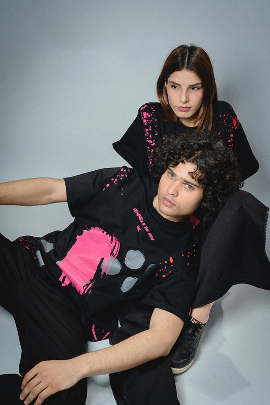 Male and female model wearing Compassion is the New Kink T-shirt 