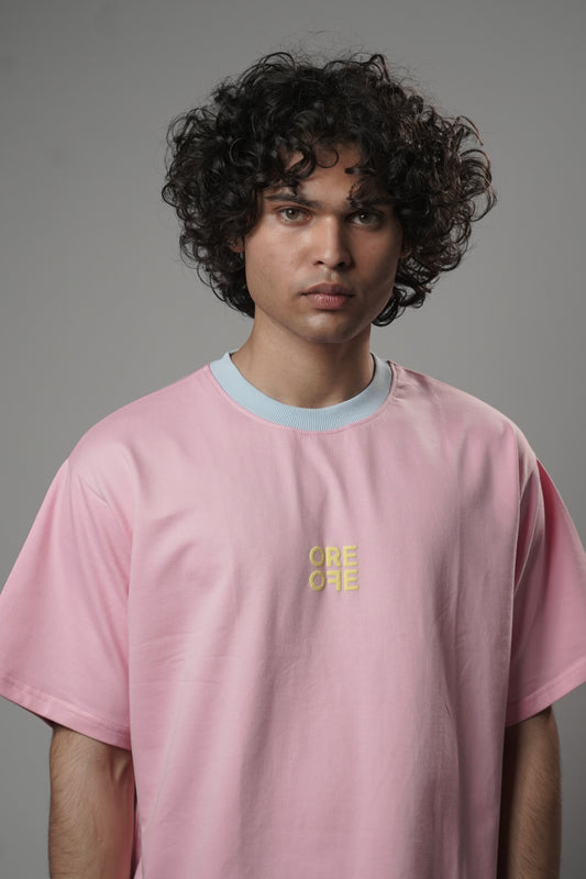 Male model wearing Pink basic Oversized T-shirt