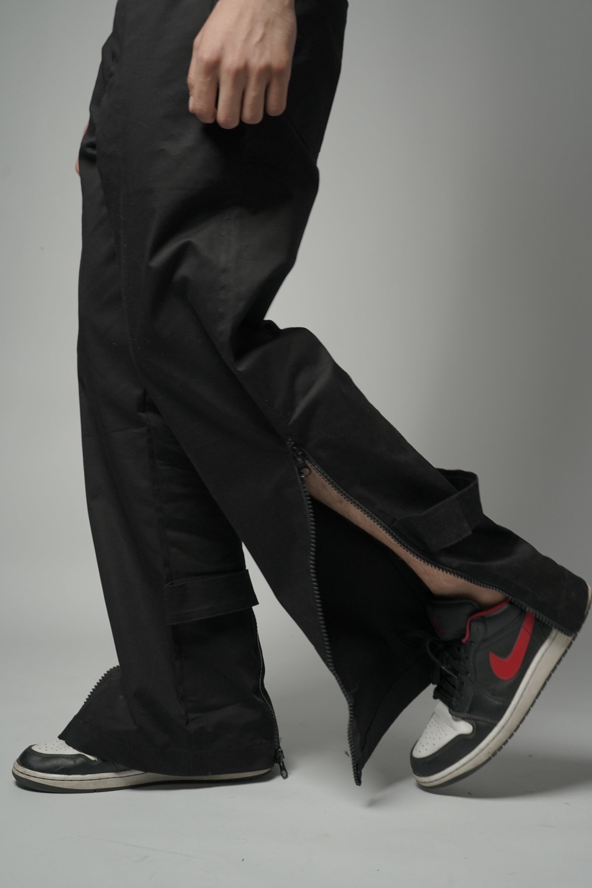 Black Baggy Zipper Pants with Utility zips, leg-revealing zips, and back-flaring zips