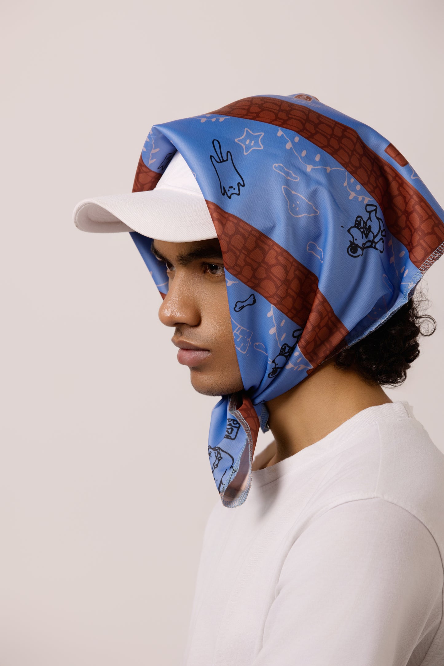 Model wearing the Super Mario-inspired bandana as a headband, featuring a playful, pixelated pet design