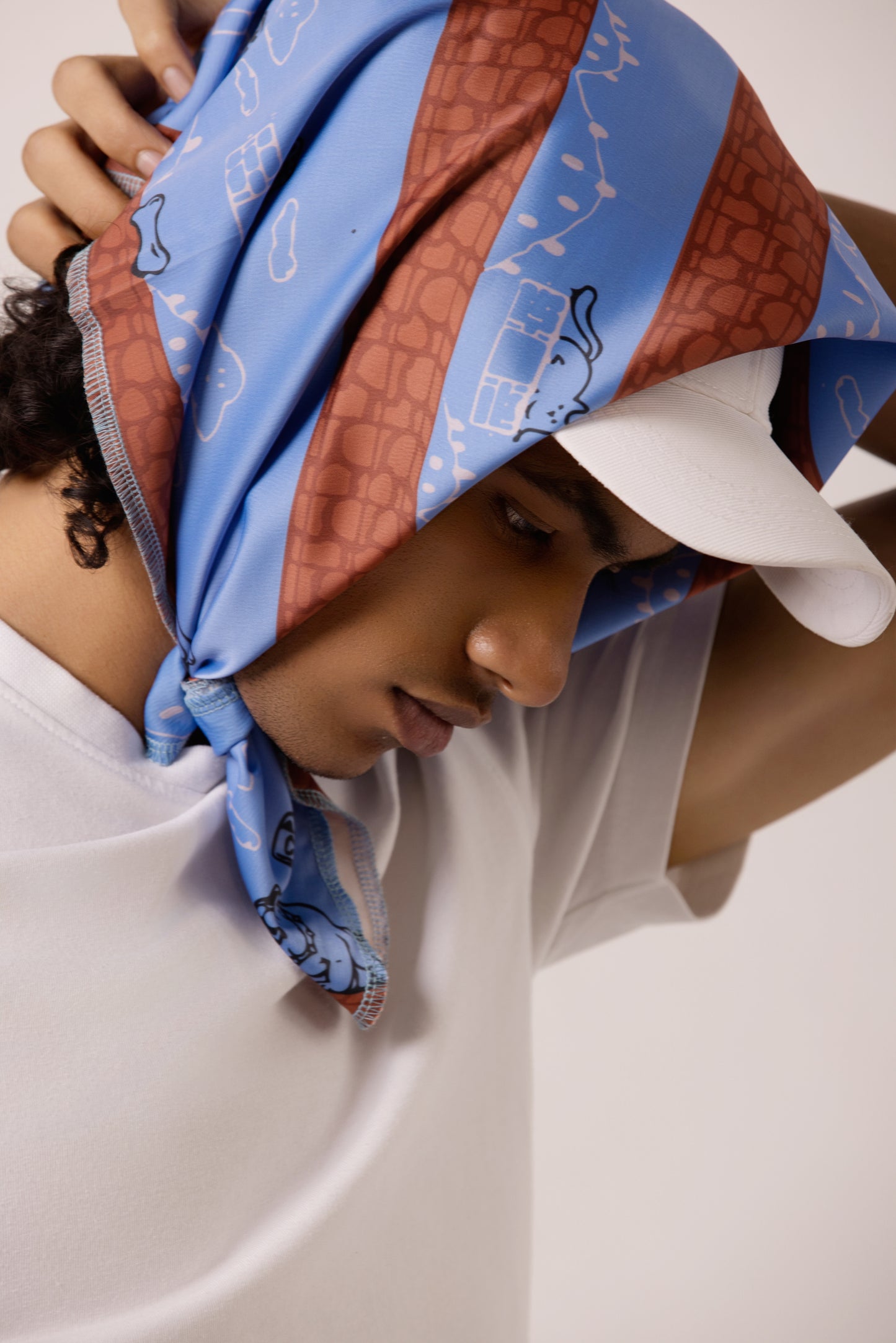 Model wearing the Super Mario-inspired bandana as a headband, featuring a playful, pixelated pet design