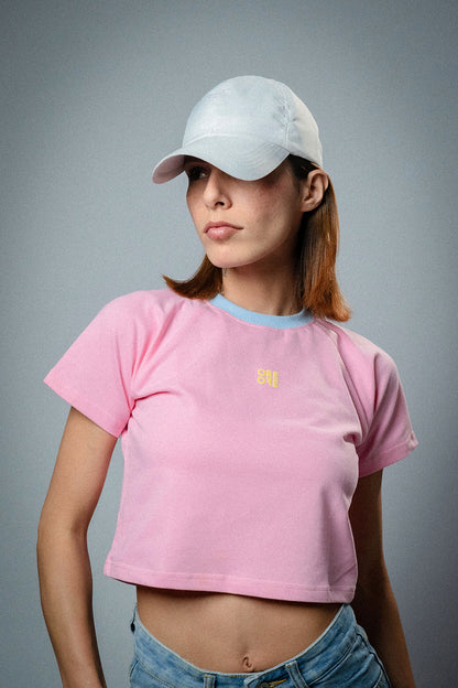 Female model wearing Pink basic crop top 