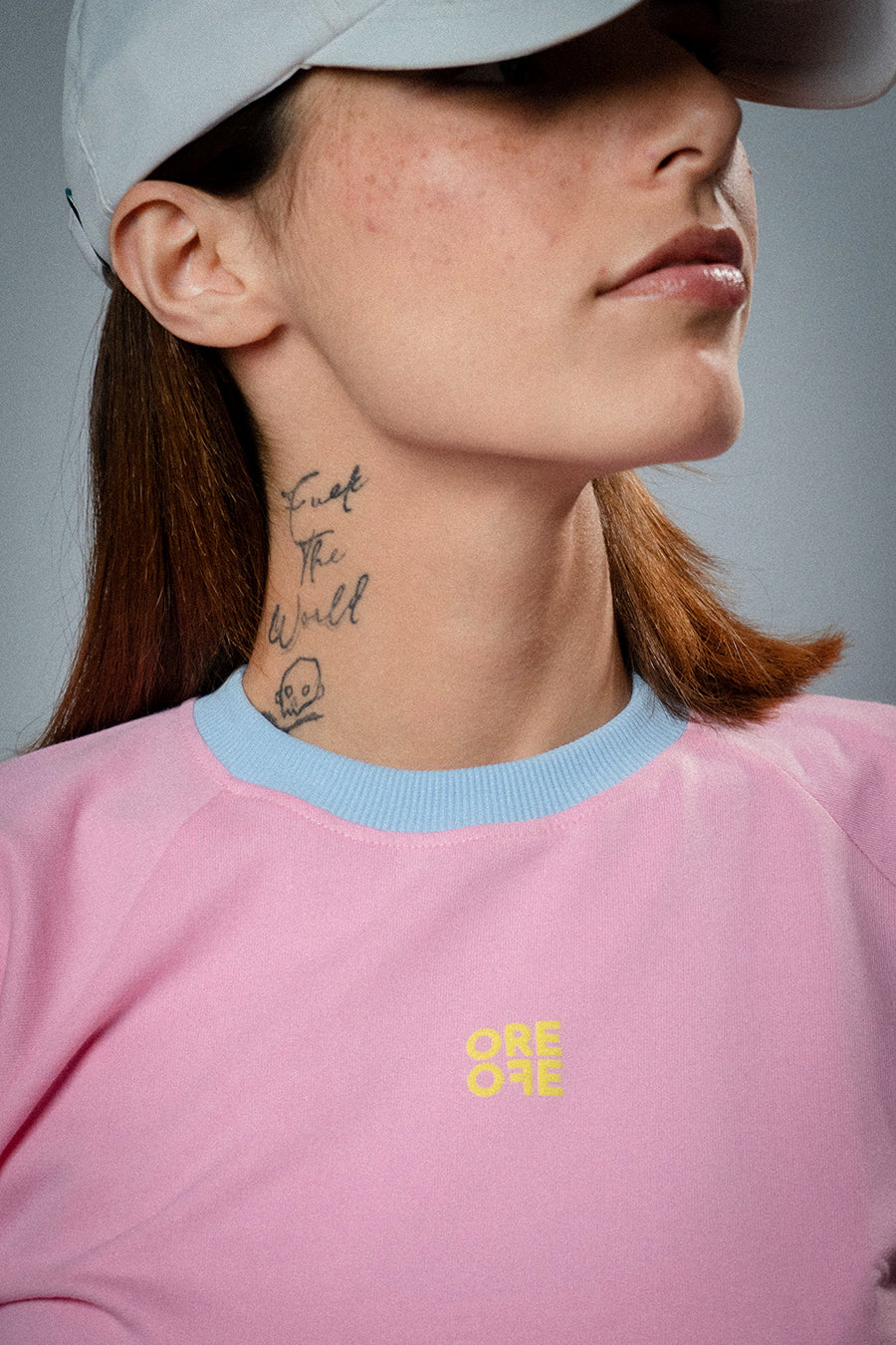 Female model wearing Pink basic crop top 