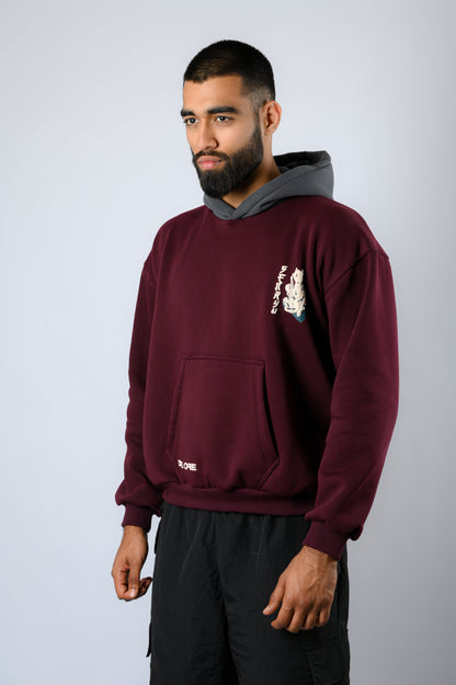 Maroon hoodie with a contrasting dark grey hood features a cat strumming the shamisen