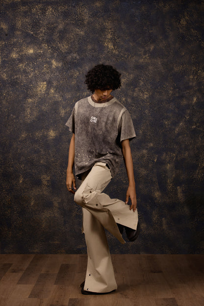 Model wearing the Premium Washed Oversized T-shirt with puffed print, made of 100% Terry Cotton.