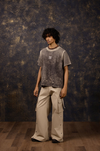 Model wearing the Premium Washed Oversized T-shirt with puffed print, made of 100% Terry Cotton